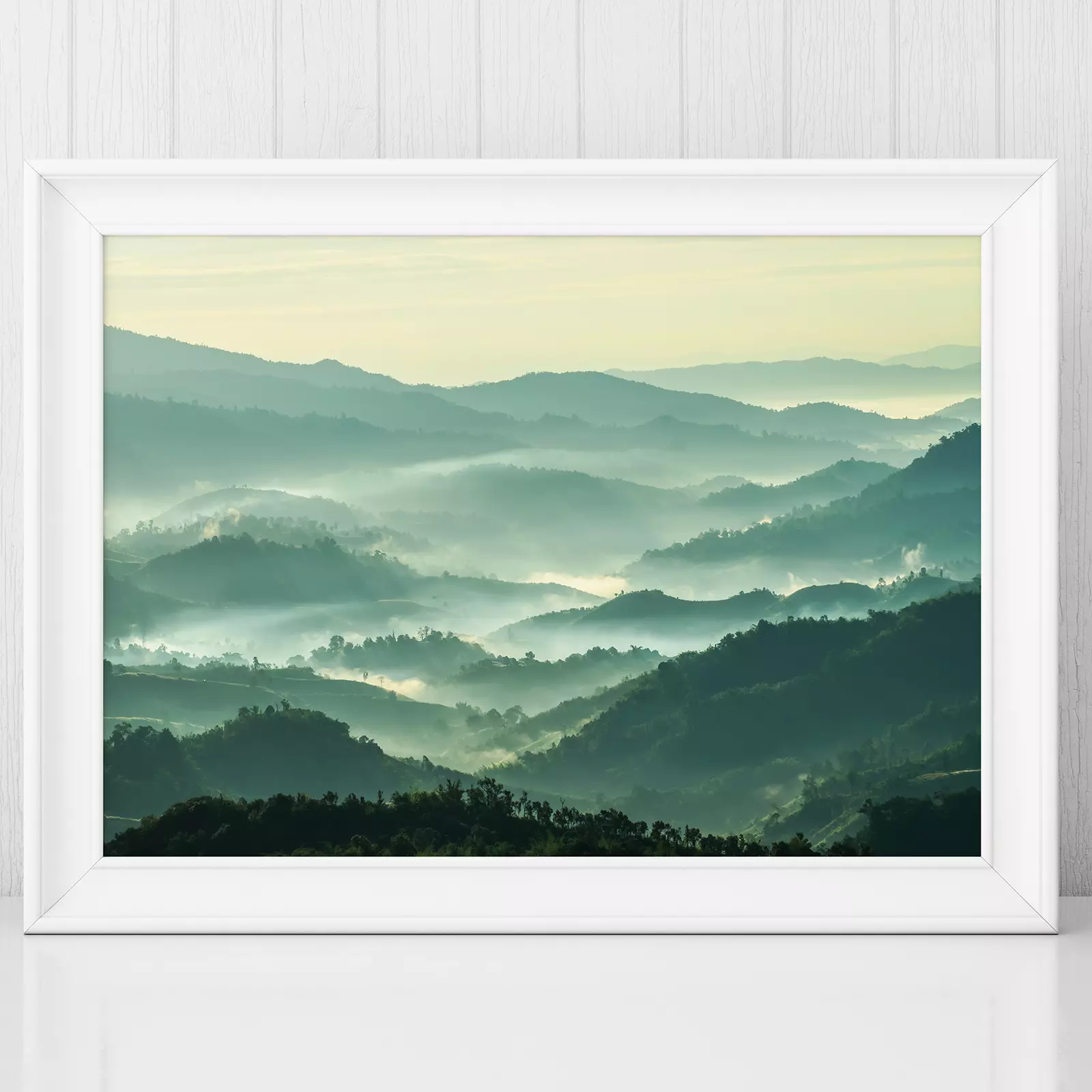 Beautiful Landscape of Mountain Layer in Morning Sun Ray and Winter Fog