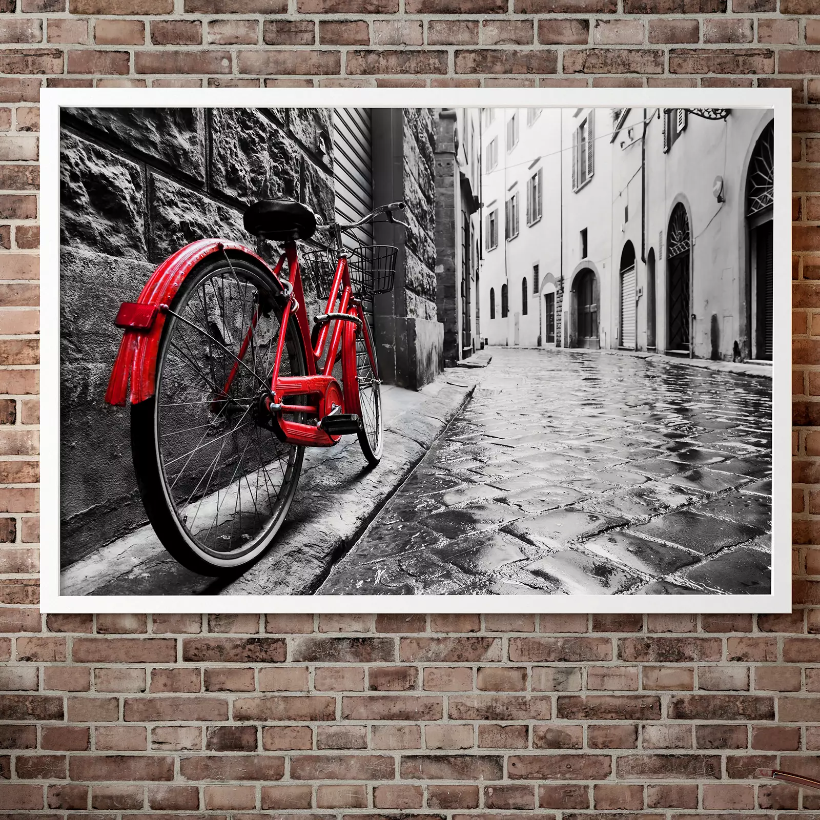 Retro vintage red bike on cobblestone street in the old town