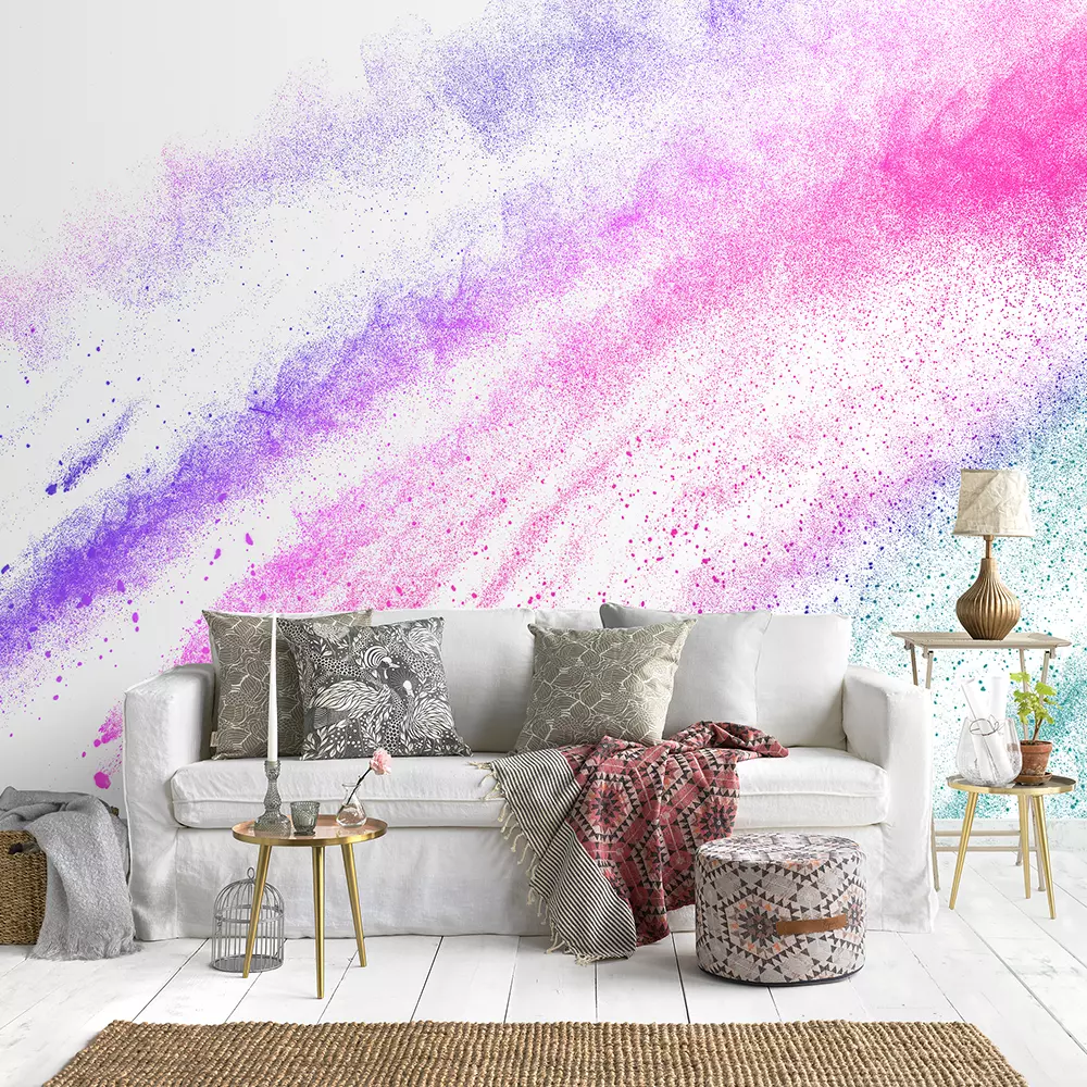 Explosion of colored powder on white background Freeze motion of color powder exploding