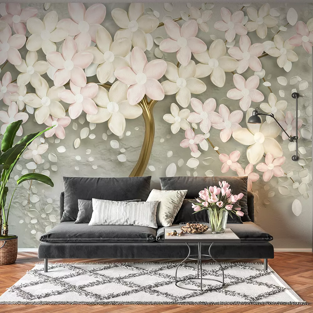 a gold vase filled with pink and white flowers