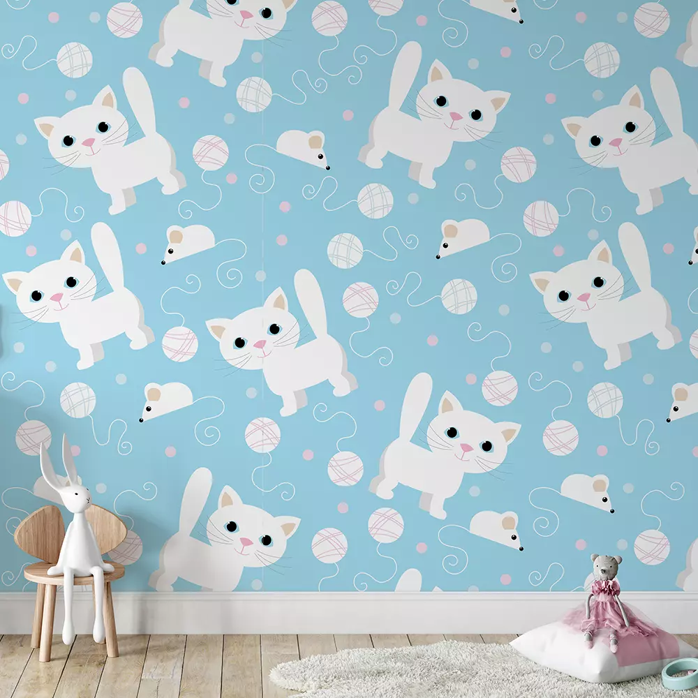 A pattern of cats and balls of yarn